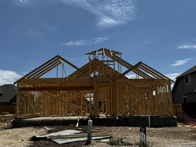 Front exterior of a new home in Megan's Landing, Castroville, TX, highlighting curb appeal (Image 1). Front exterior of a new home in Megan's Landing, Castroville, TX, highlighting curb appeal (Image 1).