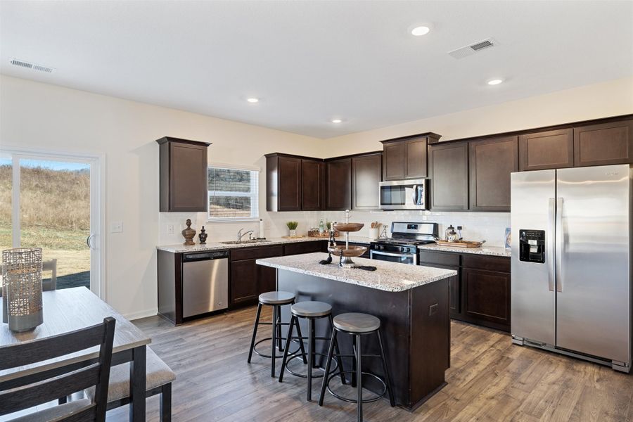 Representative furnished interior of a home built from the Hanover by D.R. Horton in Hillcrest Landing, McDonald (Image 6).