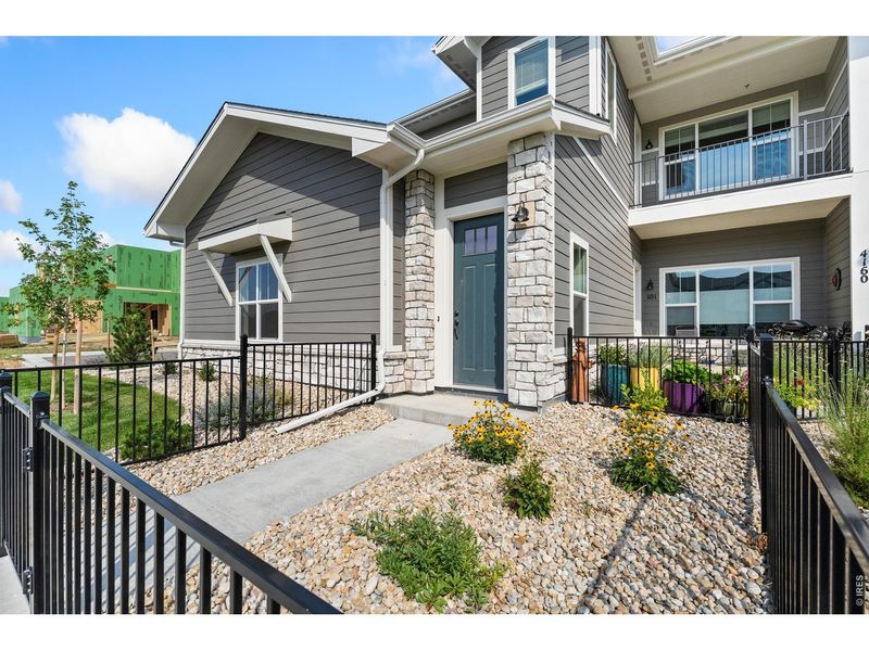 Exterior details and patio area of a home in The Lakes at Centerra, Loveland (Image 4).