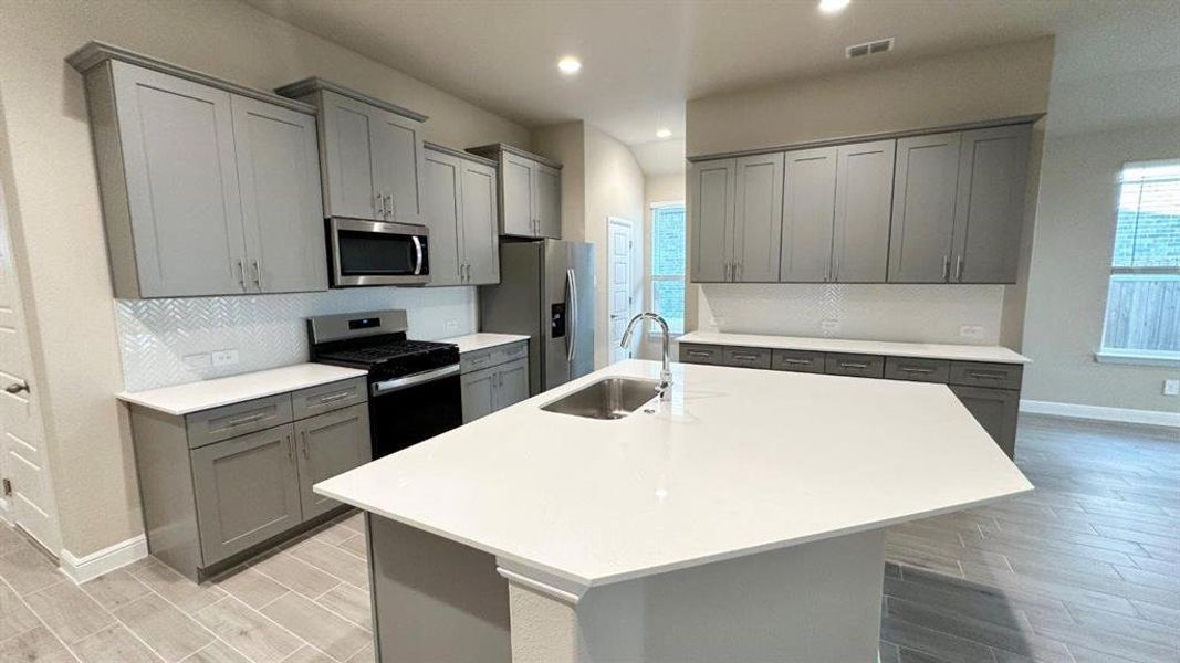 Kitchen - All Home and community information, including pricing, included features, terms, availability and amenities, are subject to change at any time without notice or obligation. All Drawings, pictures, photographs, video, square footages, floor plans, elevations, features, colors and sizes are approximate for illustration purposes only and will vary from the homes as built.