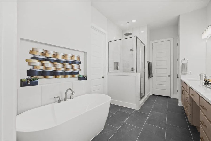Representative furnished interior of a home built from the Draco by Chesmar Homes in The Grove at Blackhawk, Pflugerville (Image 11).