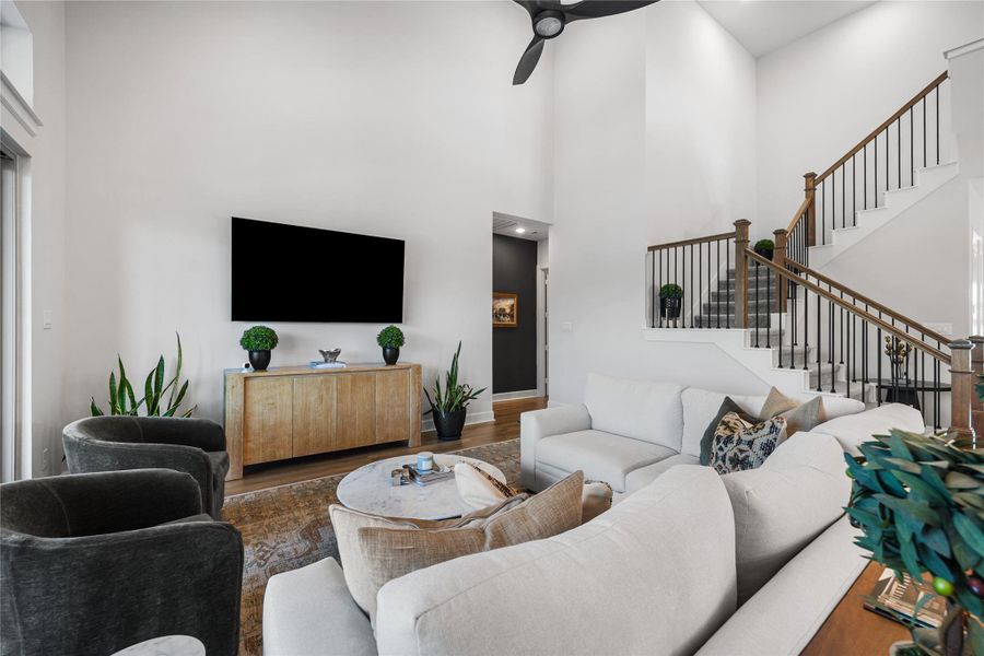 Spacious and inviting living area with abundant natural light and sliding glass doors providing seamless access to the outdoor living space