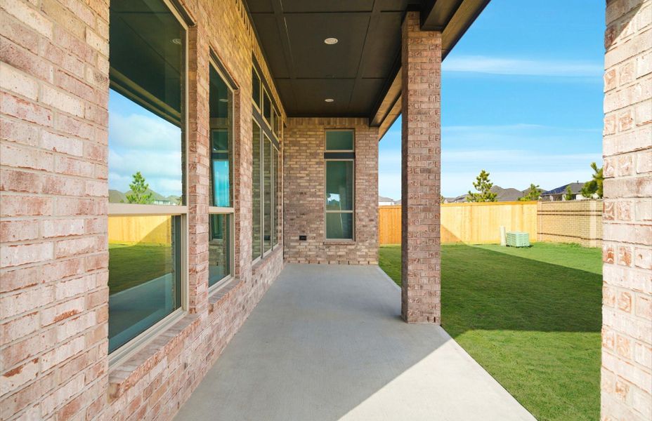 Exterior details and patio area of a home in Bridgeland 60′, Cypress (Image 20).