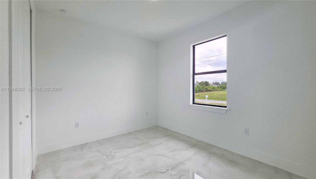 Spacious, unfurnished interior of a new home in , Lehigh Acres (Image 26).