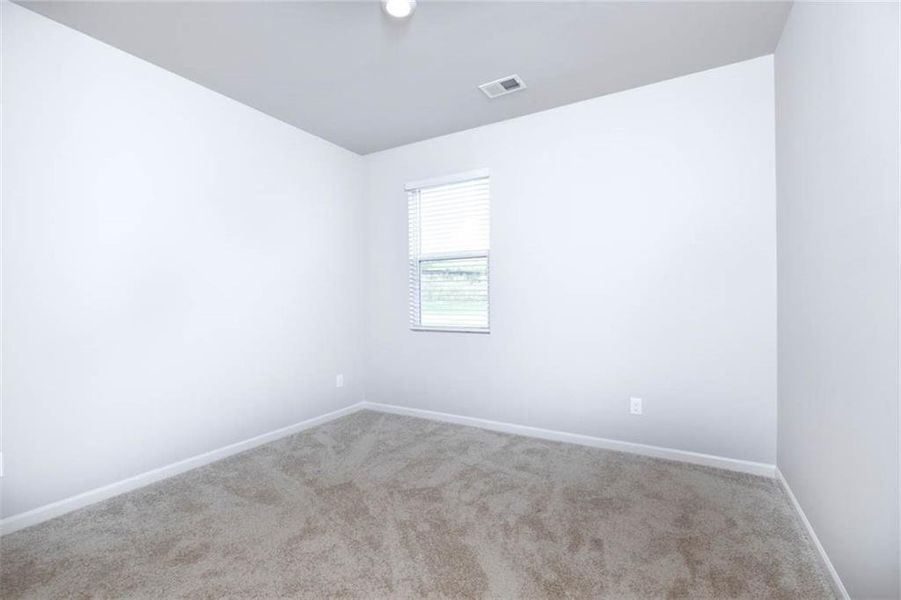 Spacious, unfurnished interior of a new home in The Reserve at Calcutta, Stockbridge (Image 22).