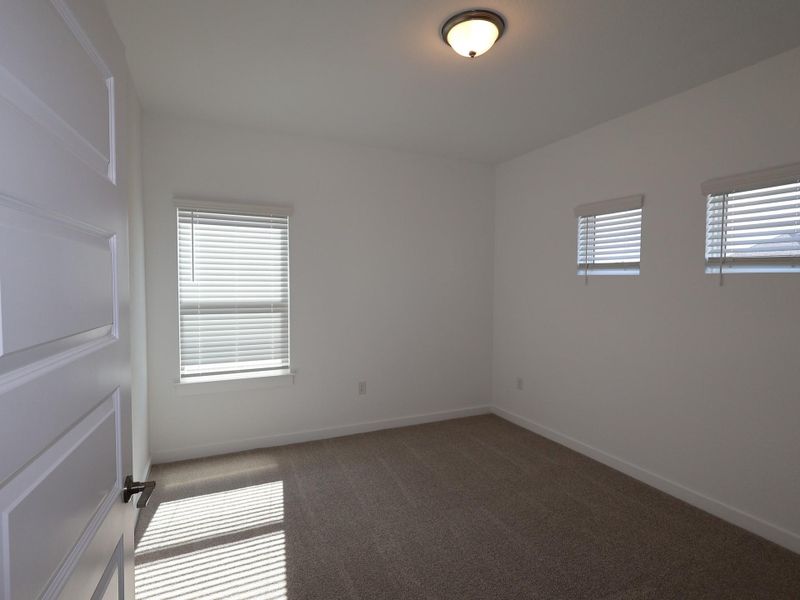 Spacious, unfurnished interior of a new home in Cedar Brook, Leander (Image 13).