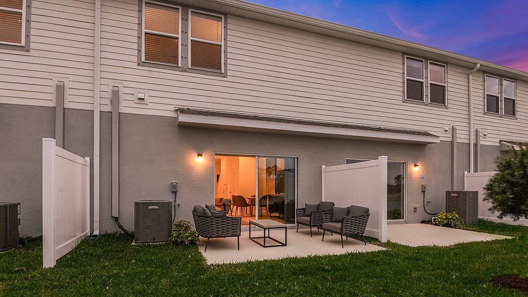 Representative exterior photo of a completed home built from the Jasmine by Taylor Morrison in Vinterra Townhomes, Nokomis, FL (Image 19).
