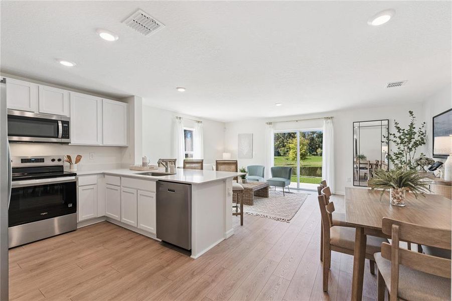 Furnished interior view inside a new home in Sandalwood, New Smyrna Beach (Image 9).