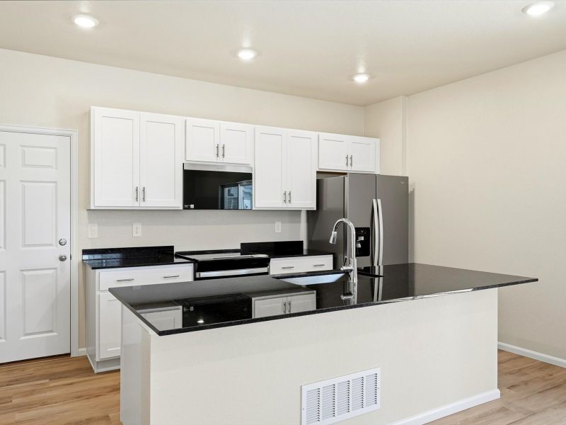 Furnished interior view inside a new home in York Station, Thornton (Image 3).