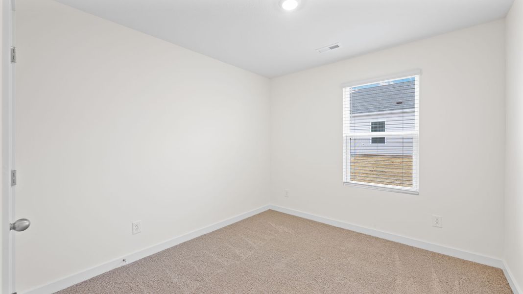 Representative unfurnished interior of a home built from the Freeport by D.R. Horton in Owensby Farms, Dayton (Image 20).