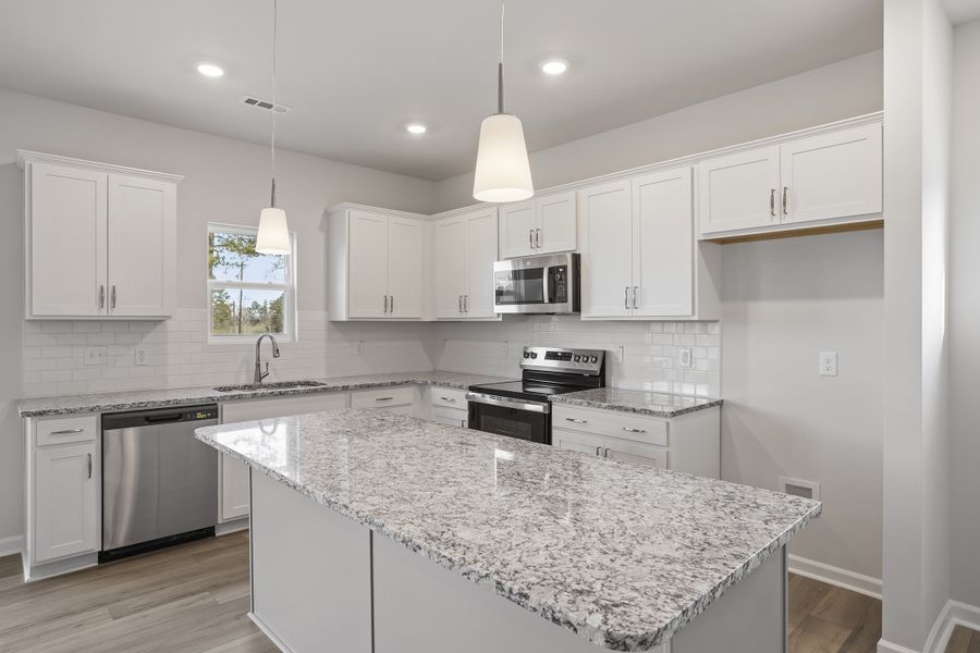 Furnished interior view inside a new home in Cambridge Reserve, Angier (Image 9). Furnished interior view inside a new home in Cambridge Reserve, Angier (Image 9).