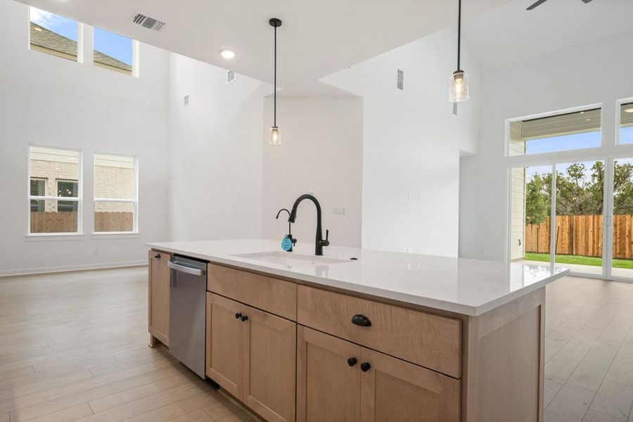 Furnished interior view inside a new home in Heritage, Dripping Springs (Image 6).