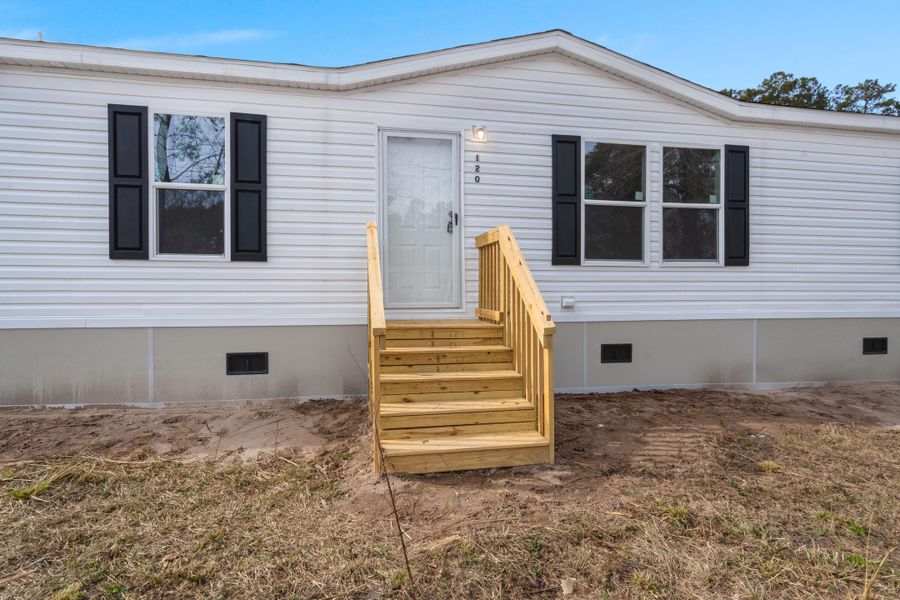 Exterior details and patio area of a home in , Summerville (Image 16).