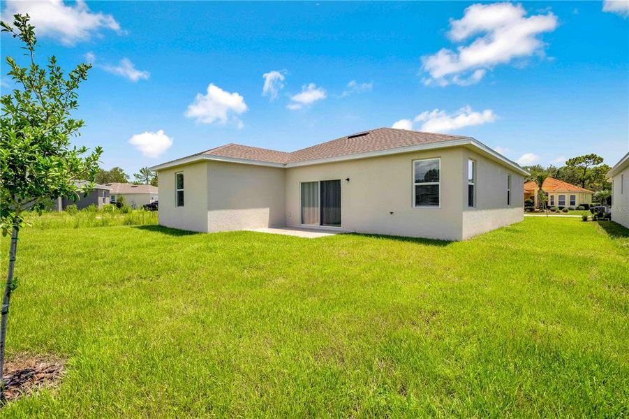 Front exterior of a new home in , Weeki Wachee, FL, highlighting curb appeal (Image 25).