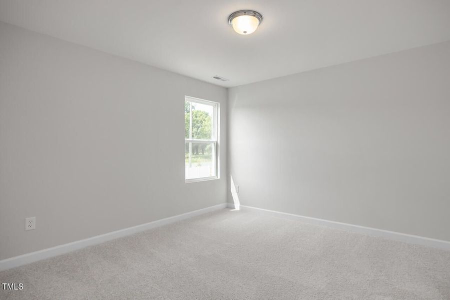 Spacious, unfurnished interior of a new home in Woodland Crossing, Zebulon (Image 24).