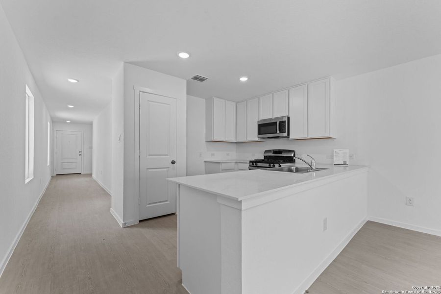 Furnished interior view inside a new home in Torian Village: Belmar Collection, San Antonio (Image 6).