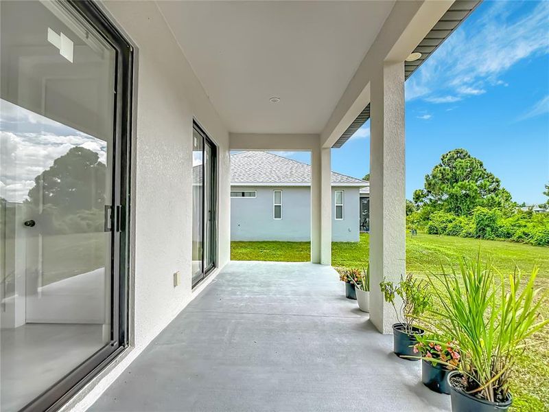 Exterior details and patio area of a home in , Lehigh Acres (Image 4). Exterior details and patio area of a home in , Lehigh Acres (Image 4).