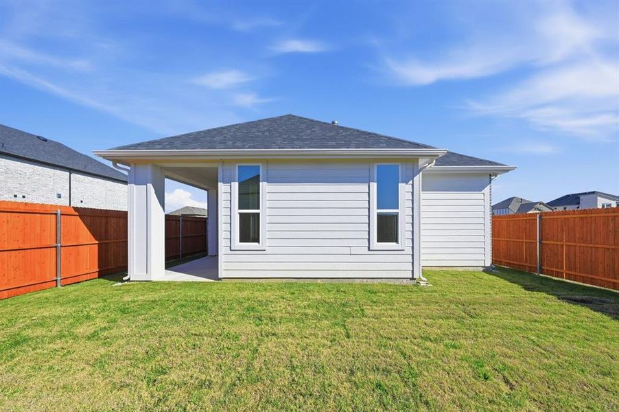 Exterior details and patio area of a home in Heartland, Crandall (Image 3).