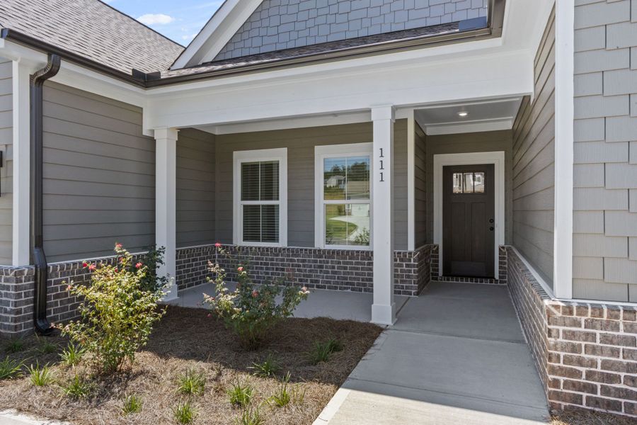 Exterior details and patio area of a home in Cherokee Knoll, Williamston (Image 3). Exterior details and patio area of a home in Cherokee Knoll, Williamston (Image 3).