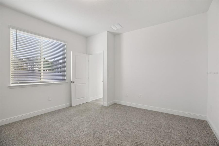 Spacious, unfurnished interior of a new home in Cyrene at Minneola - Villas, Minneola (Image 36).