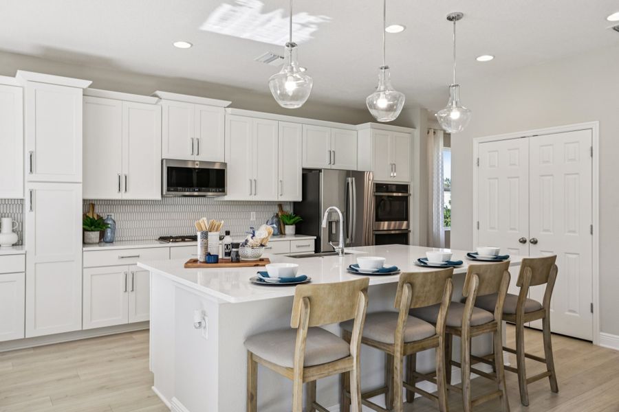 Representative furnished interior of a home built from the Palmer Executive by Risewell Homes in Bargrove Estates, Mount Dora (Image 8).