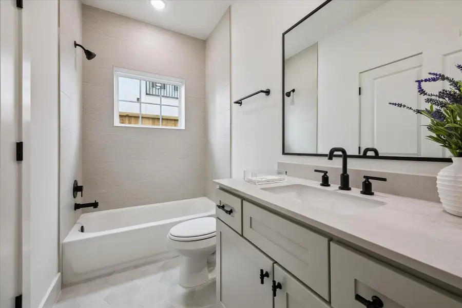 All bedrooms include en-suite full baths, beautifully finished with to-ceiling tile