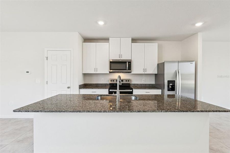Furnished interior view inside a new home in , Lake Alfred (Image 5).