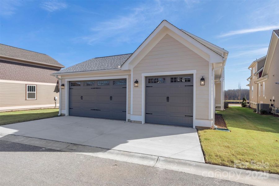 Front exterior of a new home in Riverwalk, Rock Hill, SC, highlighting curb appeal (Image 18).
