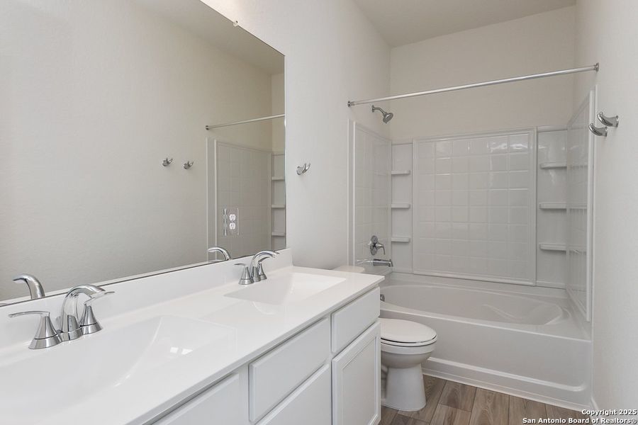 Furnished interior view inside a new home in Woodside Farms, Seguin (Image 4).