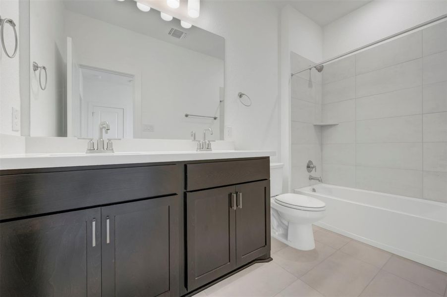 Furnished interior view inside a new home in Heritage, Dripping Springs (Image 6).