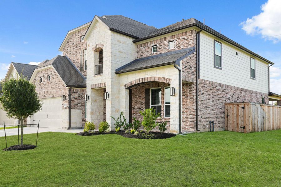 Front exterior of a new home in Morton Creek Ranch, Katy, TX, highlighting curb appeal (Image 15).