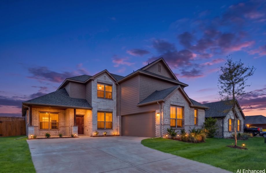 Front exterior of a new home in Summerwood, Red Oak, TX, highlighting curb appeal (Image 2). Front exterior of a new home in Summerwood, Red Oak, TX, highlighting curb appeal (Image 2).