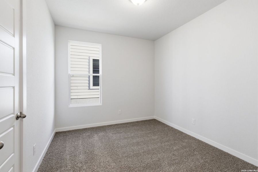 Spacious, unfurnished interior of a new home in The Meadows at Hunters Ranch, San Antonio (Image 27).