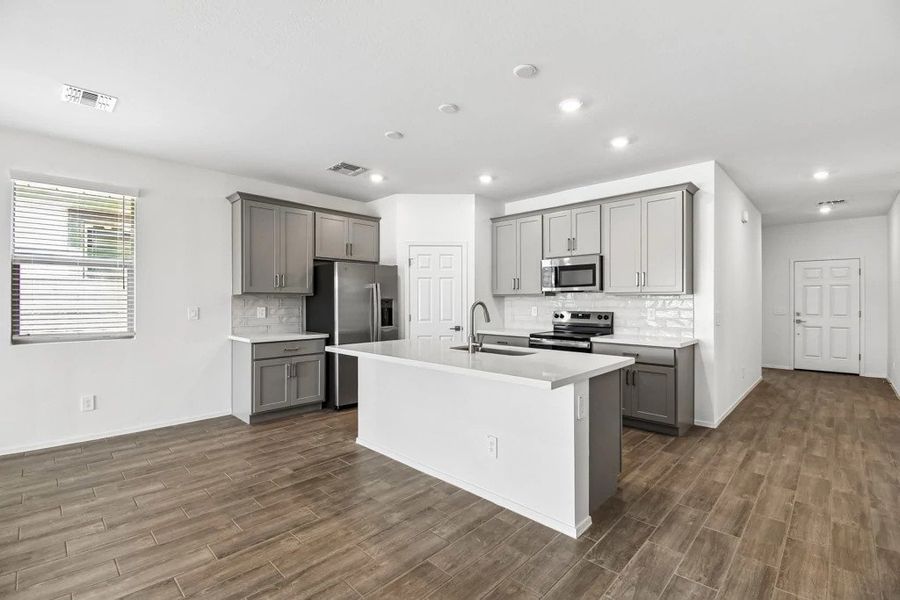 Kitchen featuring the Milan Collection. Not actual home, finishes and options may vary. Kitchen featuring the Milan Collection. Not actual home, finishes and options may vary.