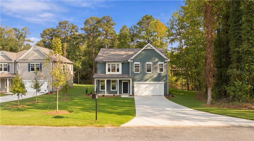 Front exterior of a new home in , Lawrenceville, GA, highlighting curb appeal (Image 23).