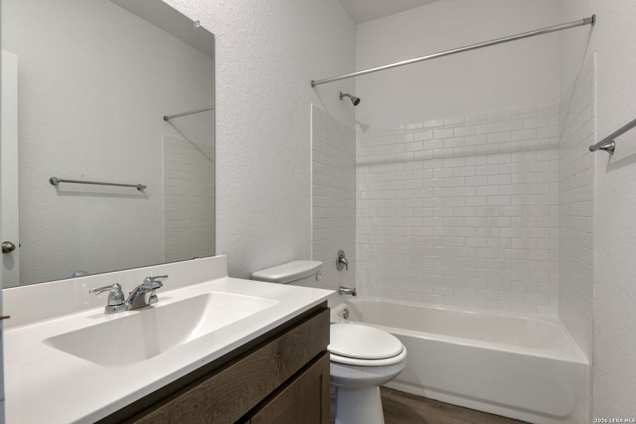 Furnished interior view inside a new home in Hennersby Hollow, San Antonio (Image 12).