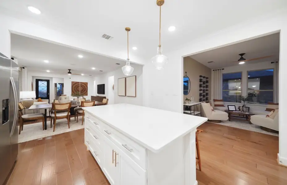 Representative furnished interior of a home built from the Flagstone by DiVosta in BeachWalk by Manasota Key, Englewood (Image 6).