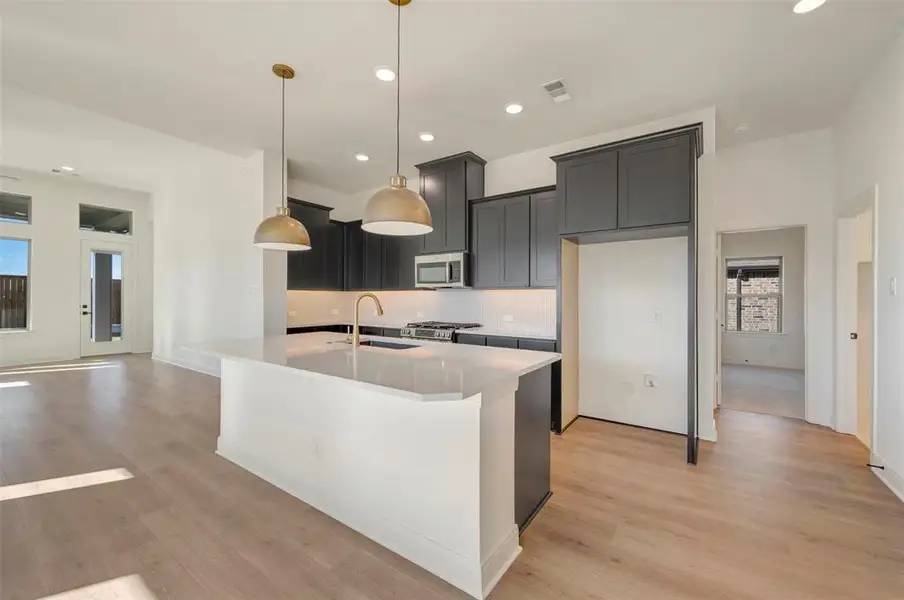 Furnished interior view inside a new home in Creekshaw – Classic, Royse City (Image 11).