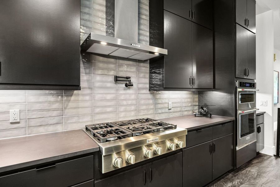 top of the line counters, with ventilation, and a pot filler top of the line counters, with ventilation, and a pot filler