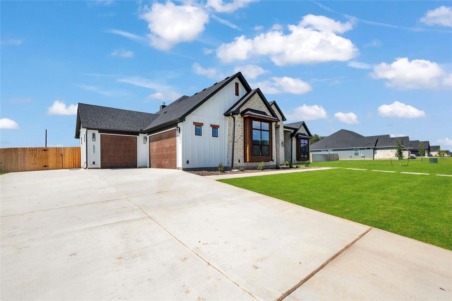 Please Note: These exterior photos are not of the actual design but are of a completed one with a similar floor plan. Finishes, features, and layouts may vary. Please Note: These exterior photos are not of the actual design but are of a completed one with a similar floor plan. Finishes, features, and layouts may vary.