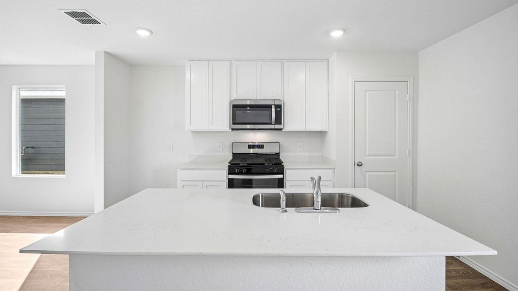 Furnished interior view inside a new home in Prairie Lakes, Buda (Image 6).