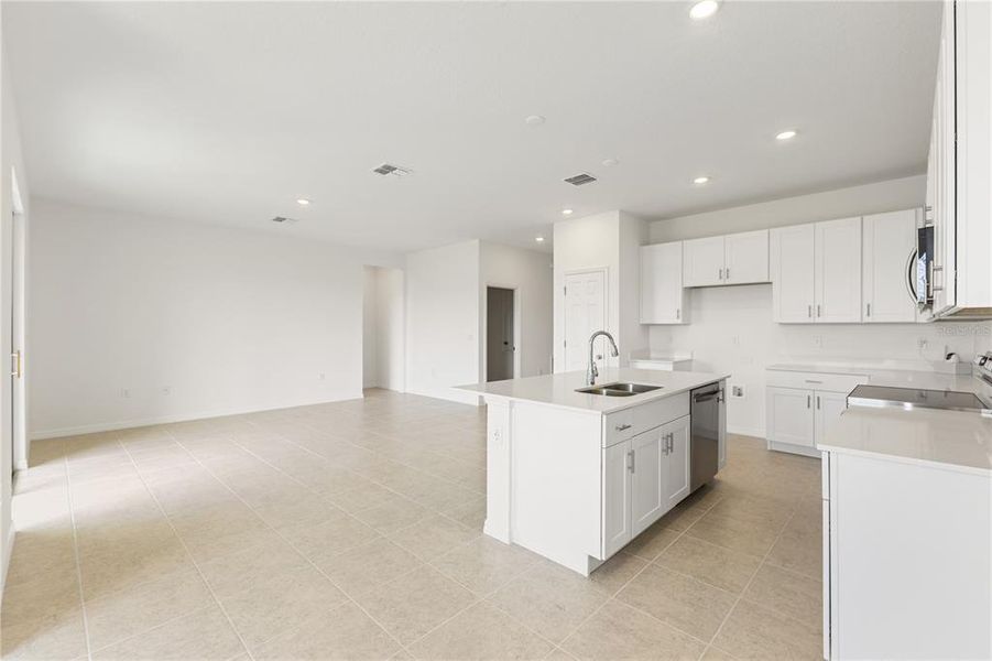 Furnished interior view inside a new home in Mirror Lake Village, Fruitland Park (Image 9).
