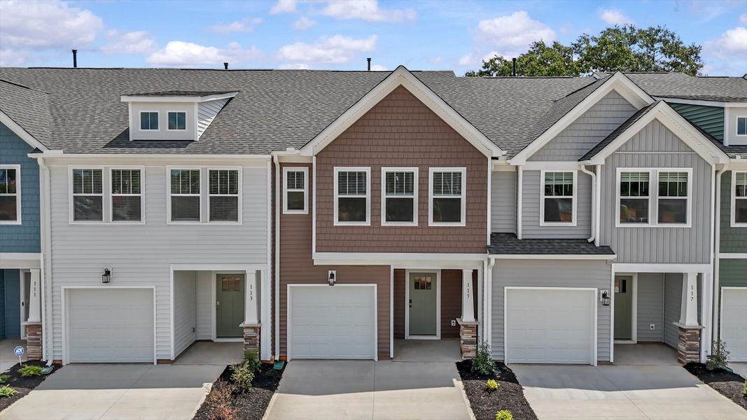 Front exterior of a new home in Saluda Crossing, Piedmont, SC, highlighting curb appeal (Image 1).