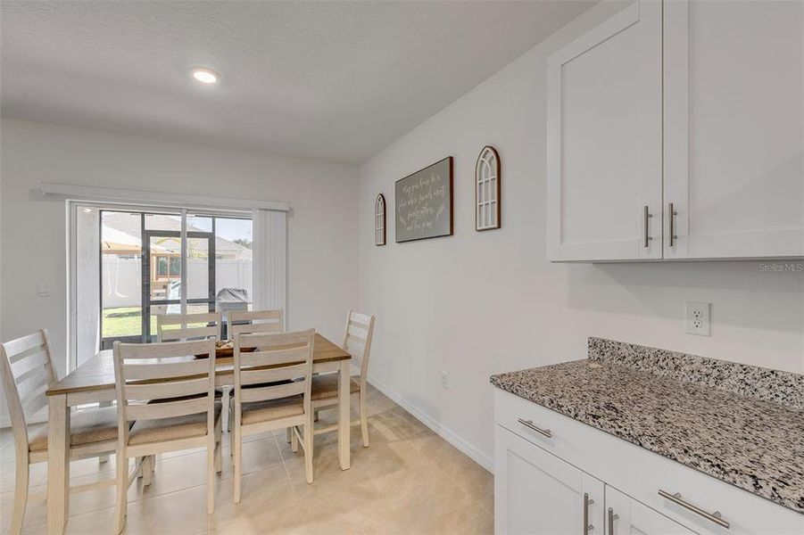 Furnished interior view inside a new home in Groveside at Ormond Station, Ormond Beach (Image 16).