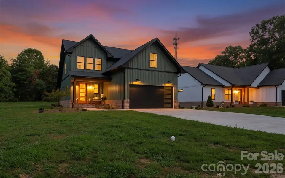 Front exterior of a new home in , Taylorsville, NC, highlighting curb appeal (Image 26). Front exterior of a new home in , Taylorsville, NC, highlighting curb appeal (Image 26).
