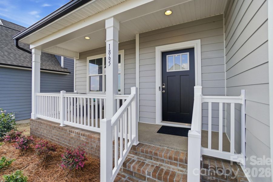 Exterior details and patio area of a home in The Meadows at Laurelbrook, Sherrills Ford (Image 28).