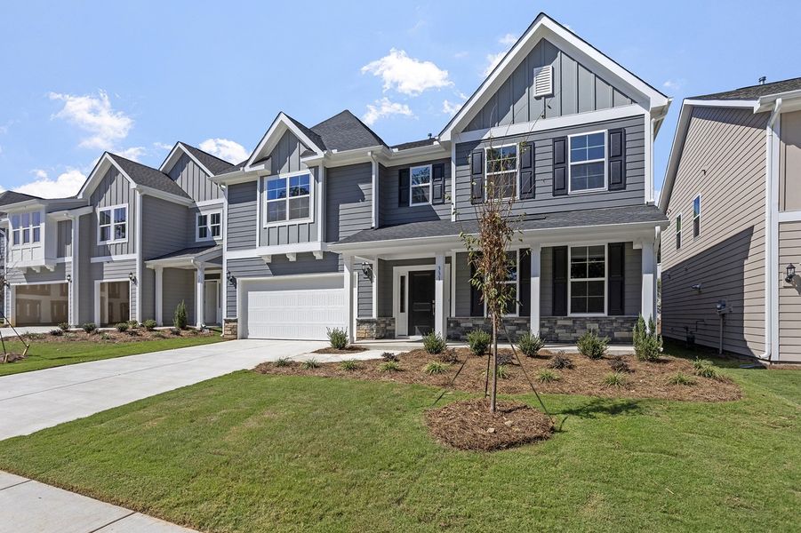 Front exterior of a new home in Georgias Landing, Raleigh, NC, highlighting curb appeal (Image 24).