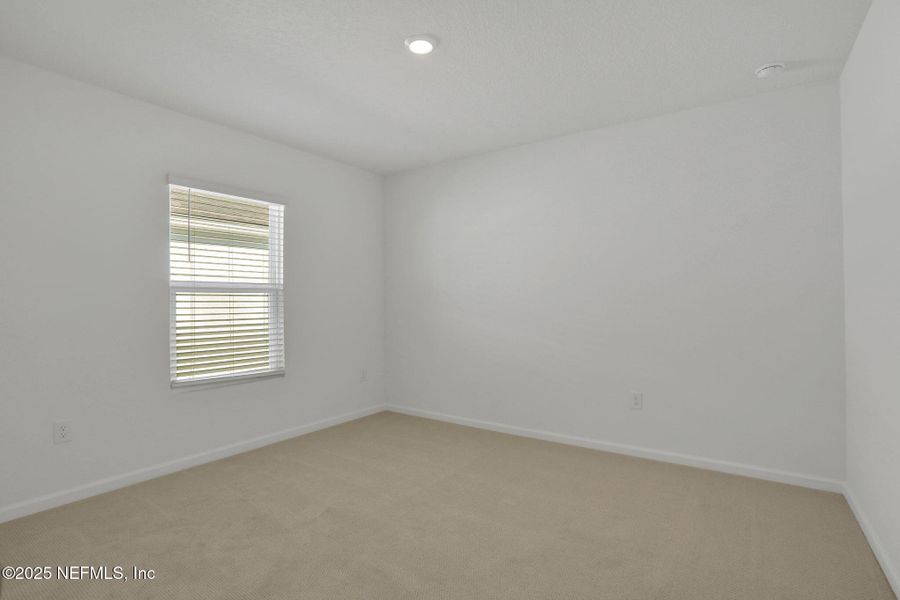 Spacious, unfurnished interior of a new home in Cordova Palms, St. Augustine (Image 22).