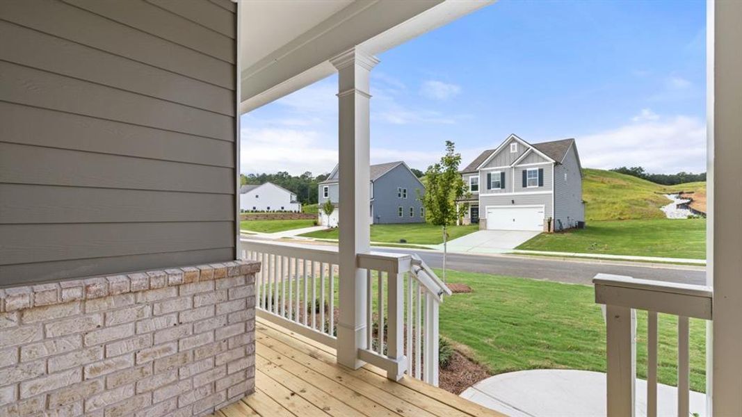 Front exterior of a new home in Sheffield Highlands, Dallas, GA, highlighting curb appeal (Image 1).