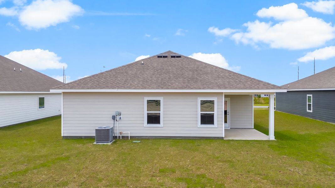 Representative exterior photo of a completed home built from the The Riverside by D.R. Horton in Liberty, Panama City, FL (Image 23).